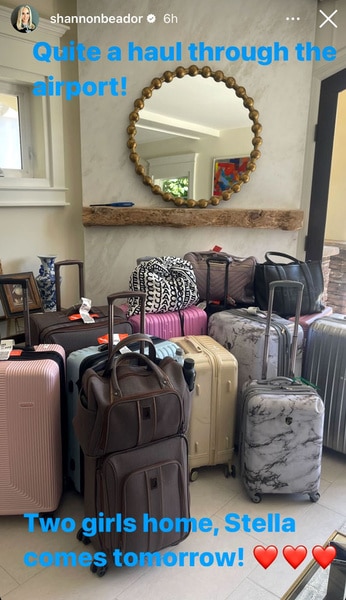 Several suitcases in Shannon Beador's living room.