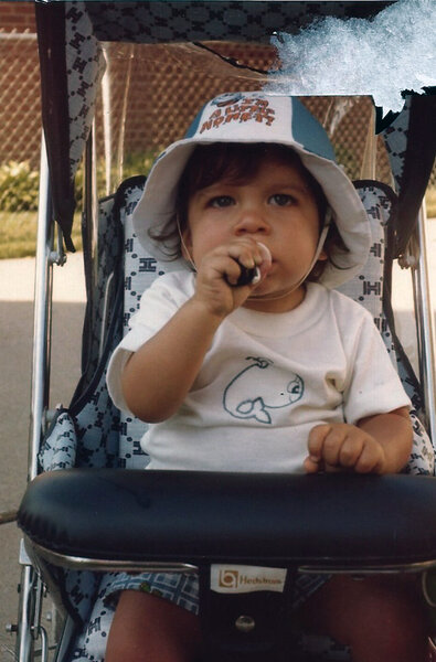 Jax Taylor sits in a stroller as a baby.