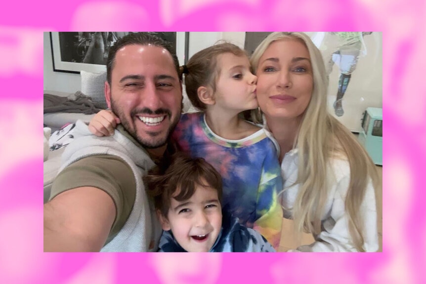Josh Altman and his wife and two kids pose for a family selfie together.