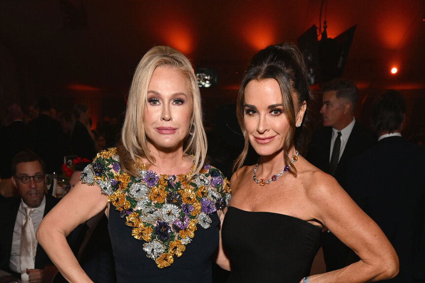 Kathy Hilton and Kyle Richards pose for a photo together.