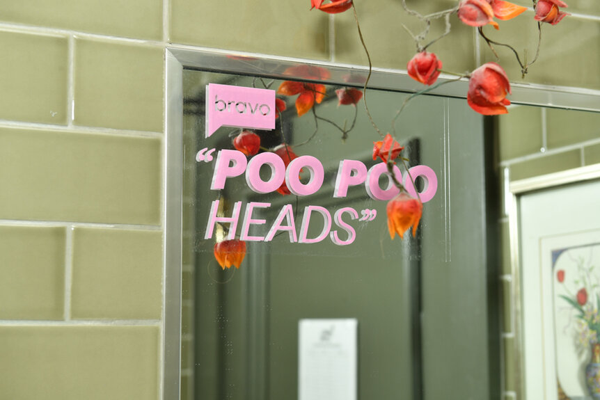 Poo Poo Head Sign at the Vanderpump Rules Season 10 reunion finale watch party in New York City.
