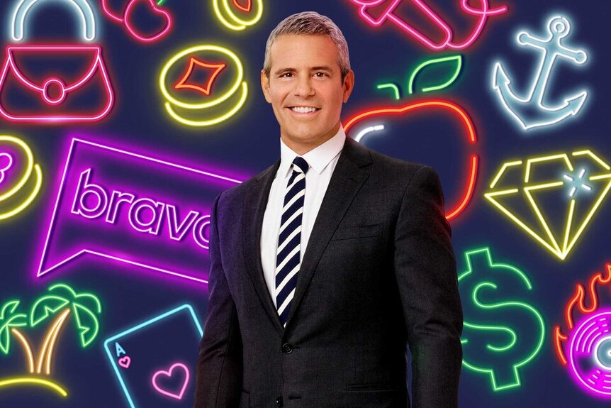 Andy Cohen overlayed on an image of neon icons representing Bravo and Las Vegas
