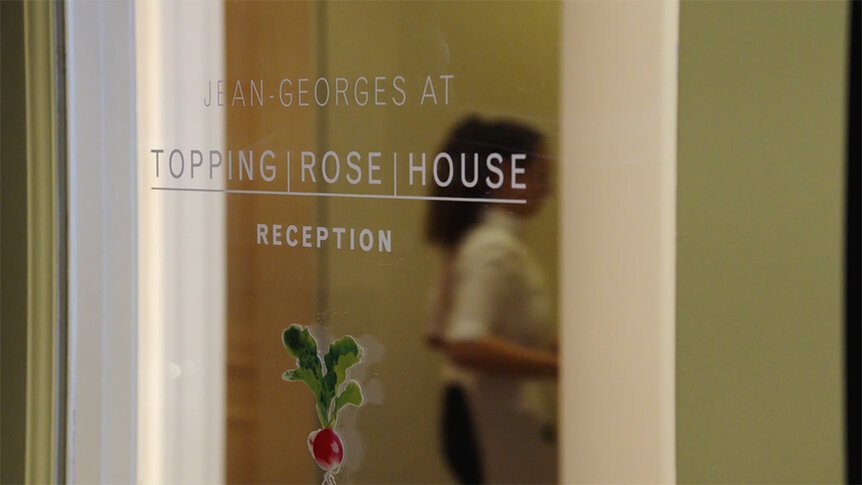 The glass signage at Jean Georges Hamptons restaurant.