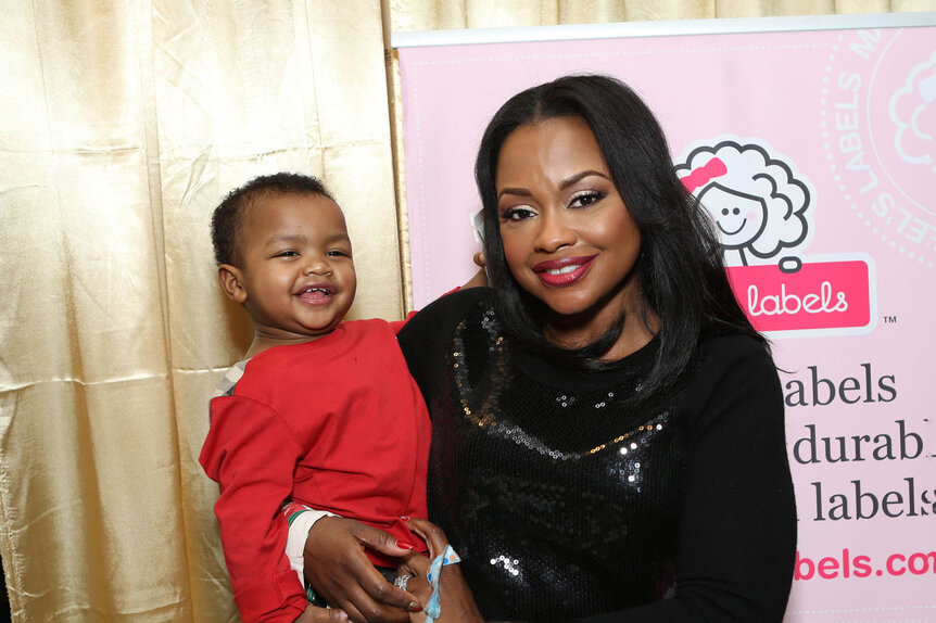 Actress Phaedra Parks and her son attends the 4th Annual Santa's Secret Workshop event.