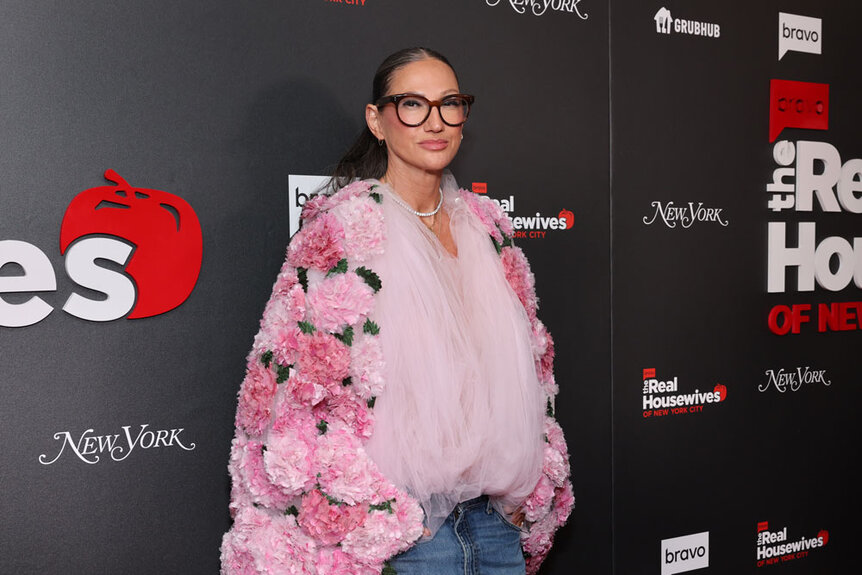 Jenna Lyons poses for a photo on a red carpet.