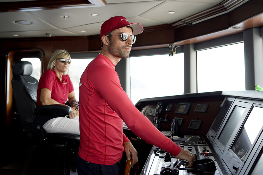 Captain Sandy Yawn and Luka Brunton in the wheelhouse of the Mustique yacht.