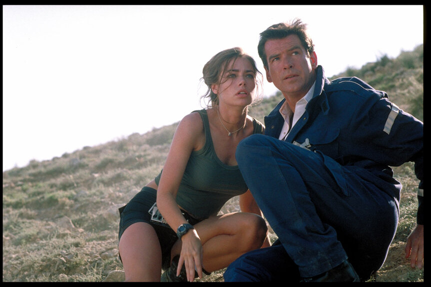 Denise Richards and Pierce Brosnan filming on location for the film The World is Not Enough