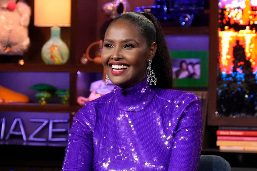 Ubah Hassan Wearing a purple dress while being a guest on WWHL.