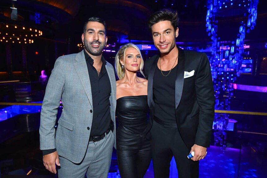 Rod Razavi, Madison LeCroy, and Andrea Denver posing and smiling together during BravoCon 2023.