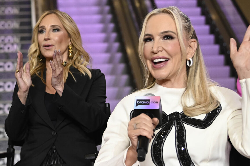 Sonja Morgan and Shannon Beador clapping and waving during the Dynamic Duo and The Tres Amigas panel at BravoCon 2023.
