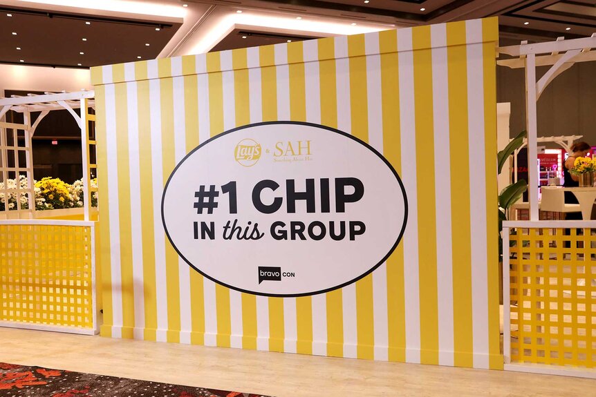 A sign reading #1 Chip in This Group at BravoCon 2023