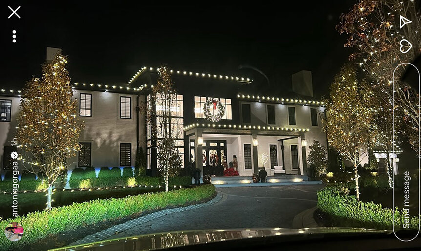 Melissa Gorga shows the exterior of her home with lights and holiday decor.