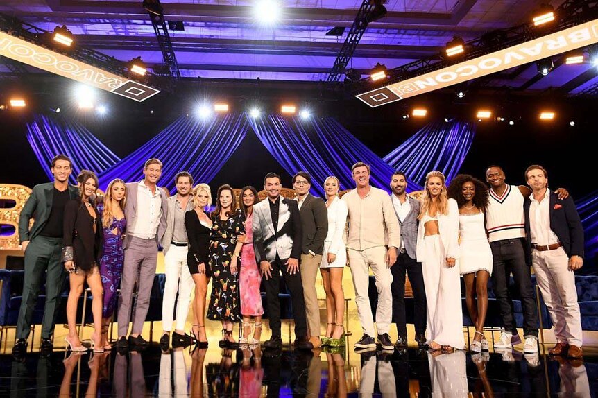 The casts of Southern Charm and Southern Hospitality pose onstage at BravoCon 2023.