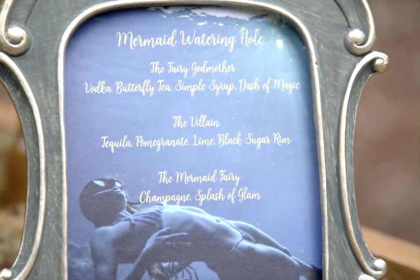 The drink menu appears in a silver frame for Grace Lilly's birthday party.