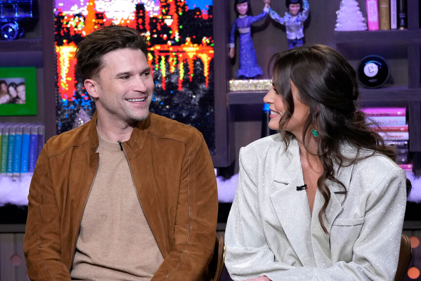 Tom Schwartz and Katie Flood smiling at each other at the Season 3 Winter House Reunion.