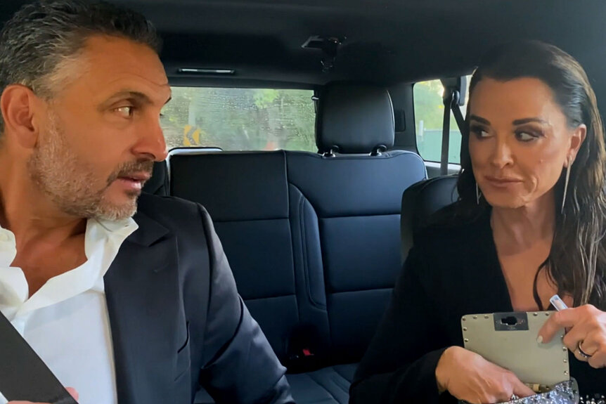 Mauricio Umansky and Kyle Richards in a car while on The Real Housewives of Beverly Hills