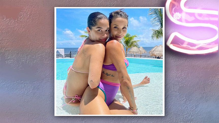 Tori Keeth and Scheana Shay sitting together in a pool.