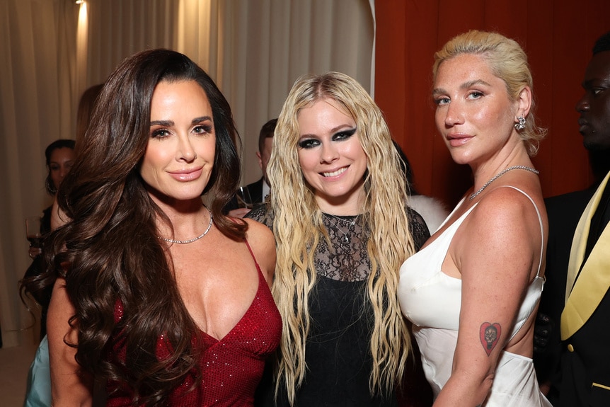 Kyle Richards, Avril Lavigne, and Kesha attend the Elton John AIDS Foundation's 32nd Annual Academy Awards Viewing Party on March 10, 2024 in West Hollywood, California.