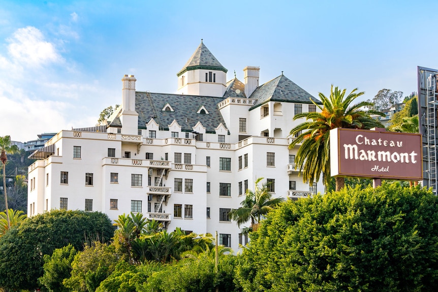 Chateau Marmont surrounded by trees.