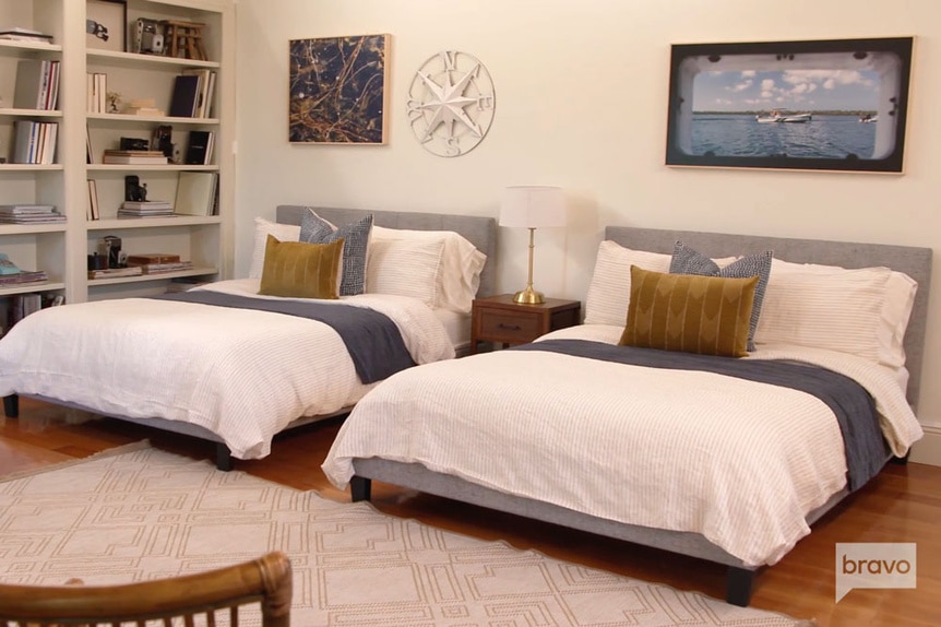 A bedroom with two beds at the Summer House Marthas Vineyard home.