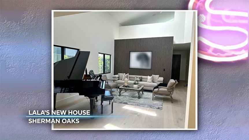 Lala Kent's formal sitting room with a piano and seating.