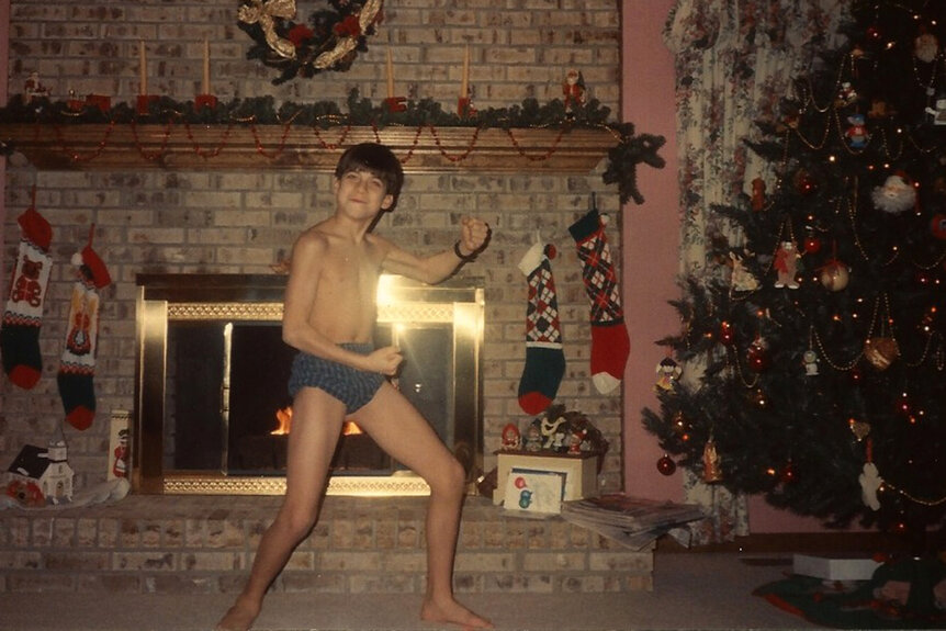 Jax Taylor shows off his muscles as a young kid.