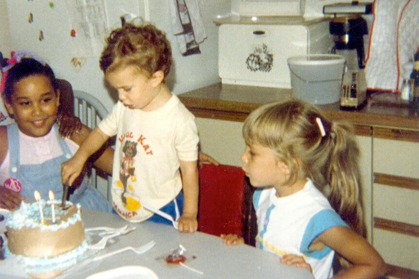 Lisa Hochstein as a child with other kids.